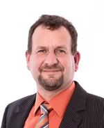 Ein Porträtfoto von Alexander Schickert